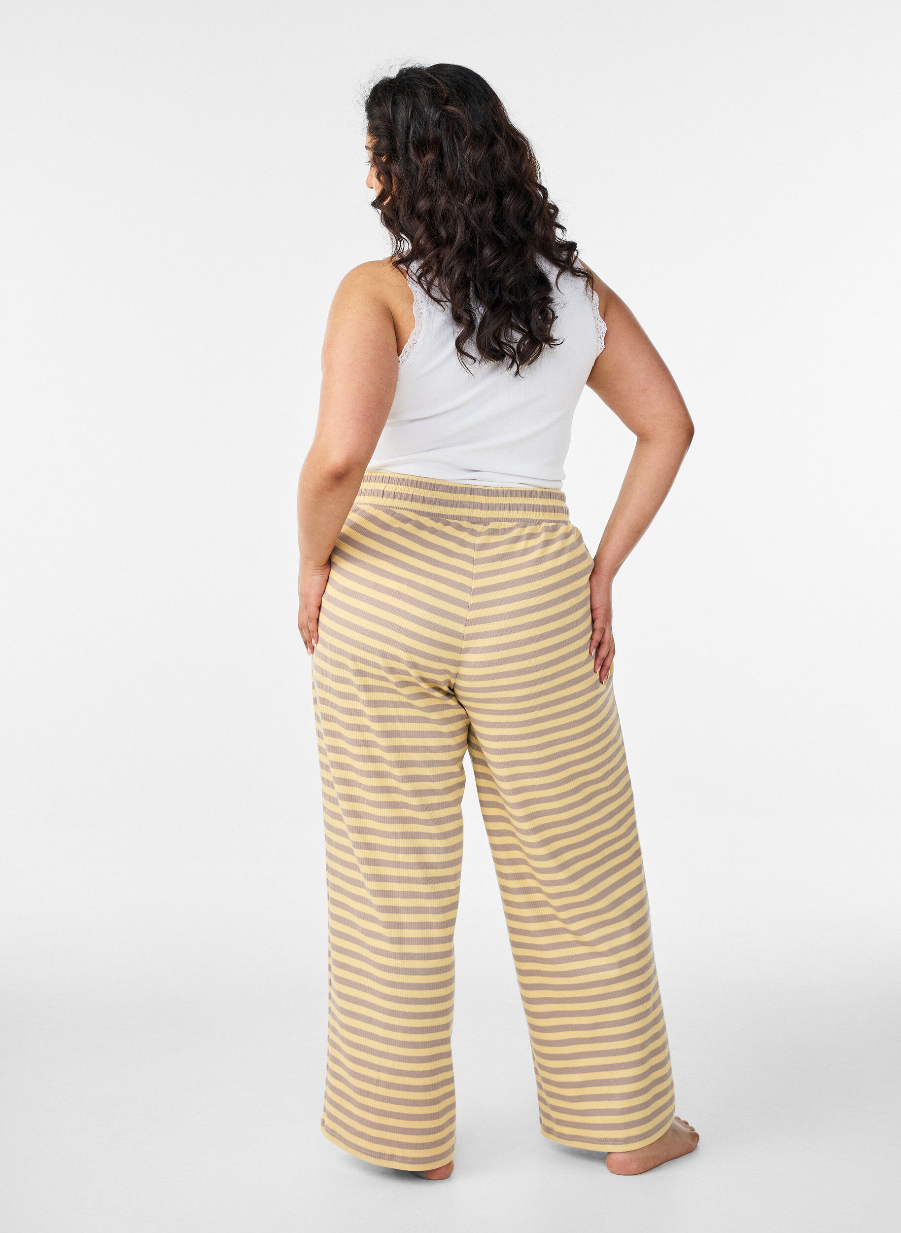 Zizzifashion Striped pyjama bottoms with a high waist and wide legs, Yellow, Model image number 1