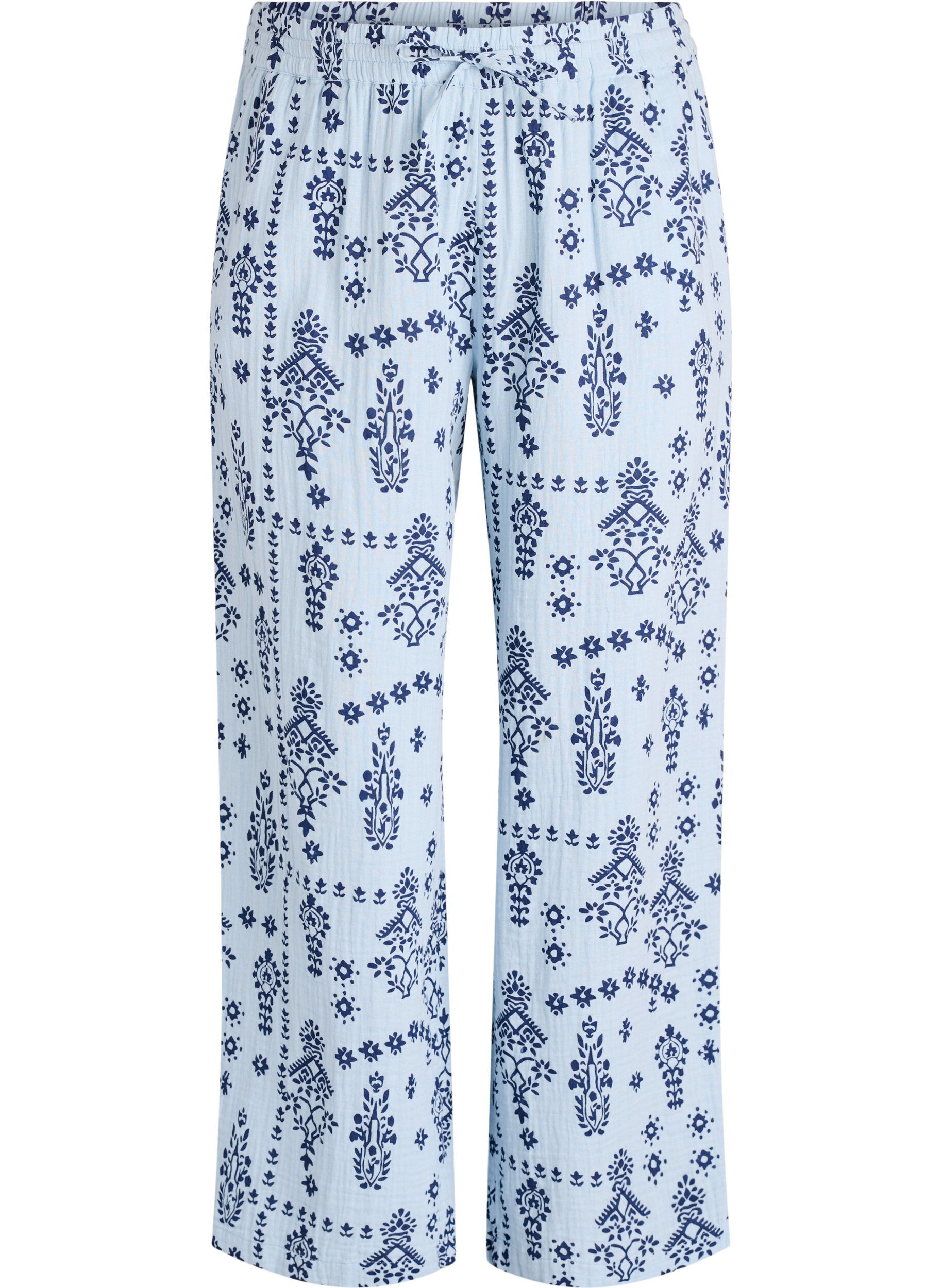 Loose trousers in cotton muslin with polka dots