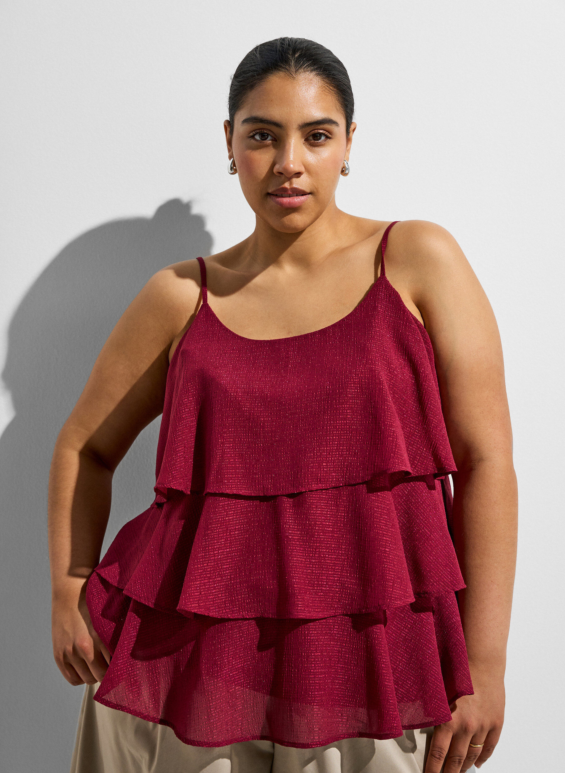 Layered top with ruffles and spaghetti straps
