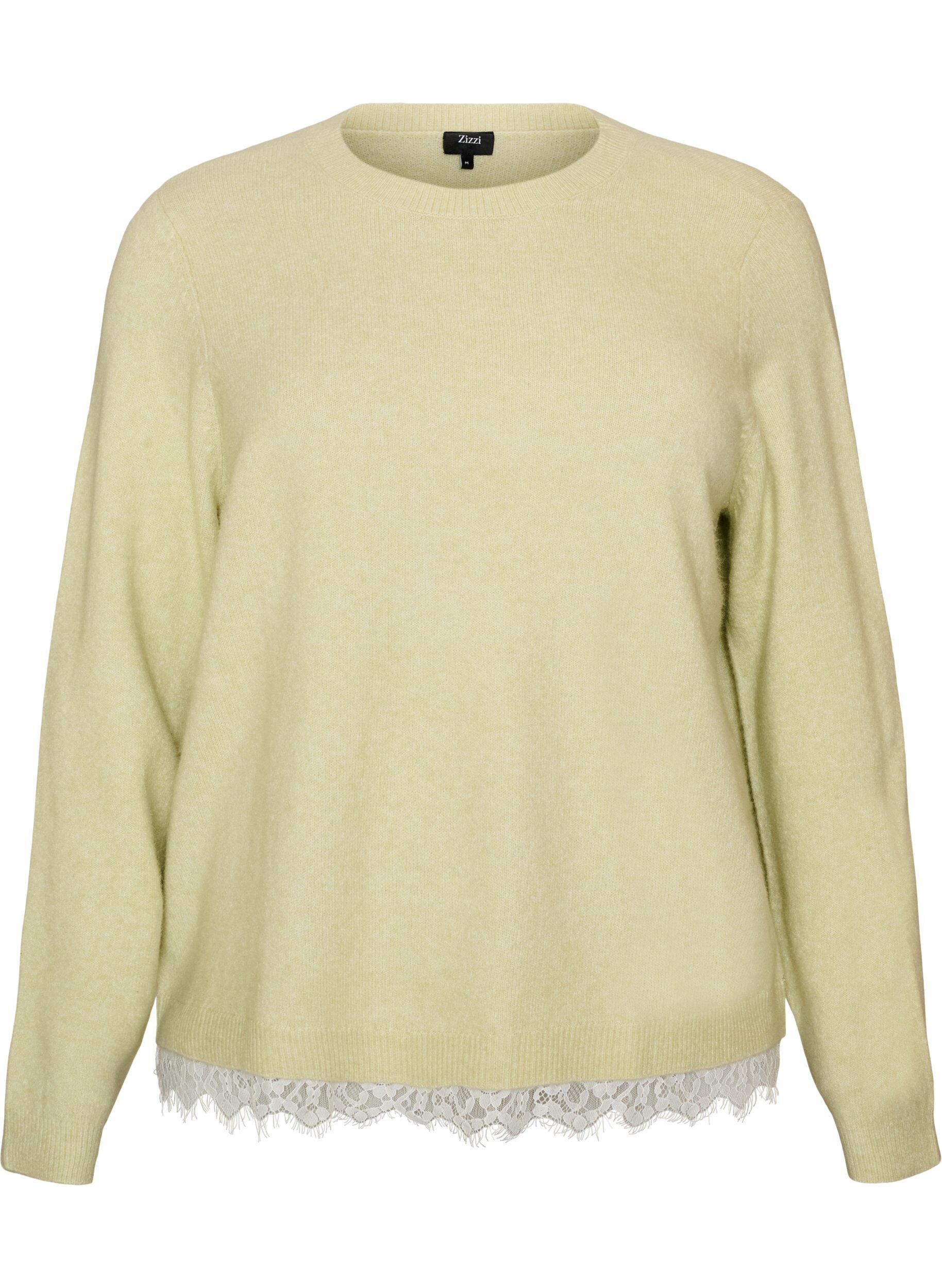 Knitted blouse with lace trim at the hem