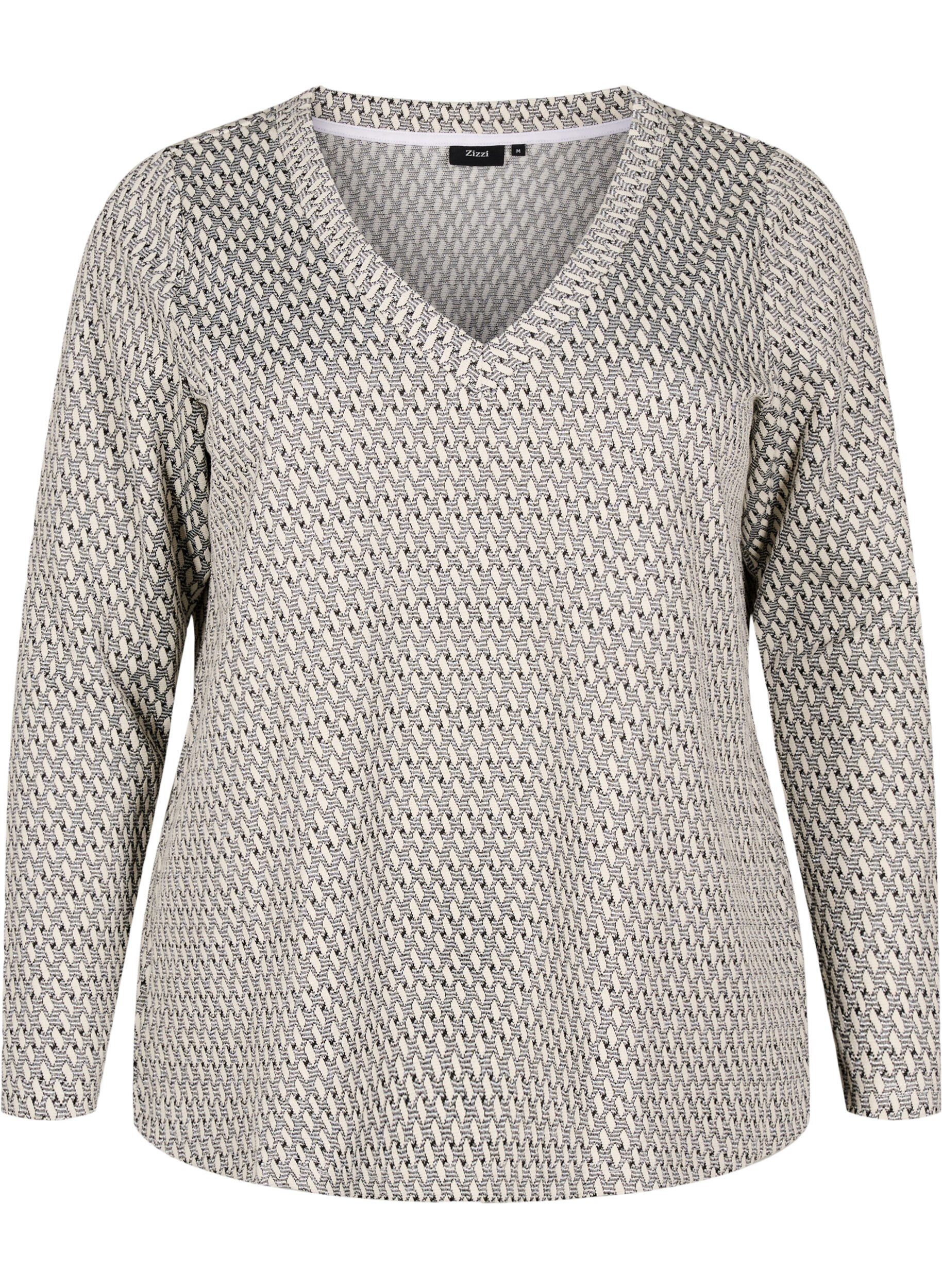 Blouse with patterned texture and glitter thread