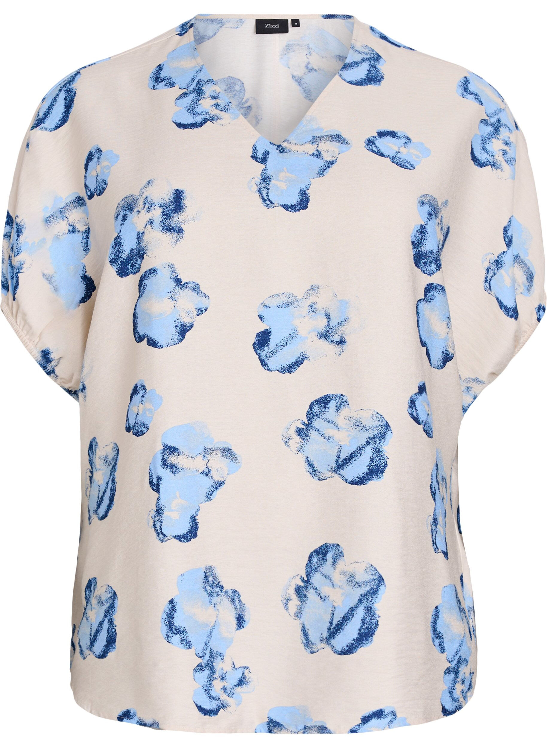 Loose blouse with print and V-neck