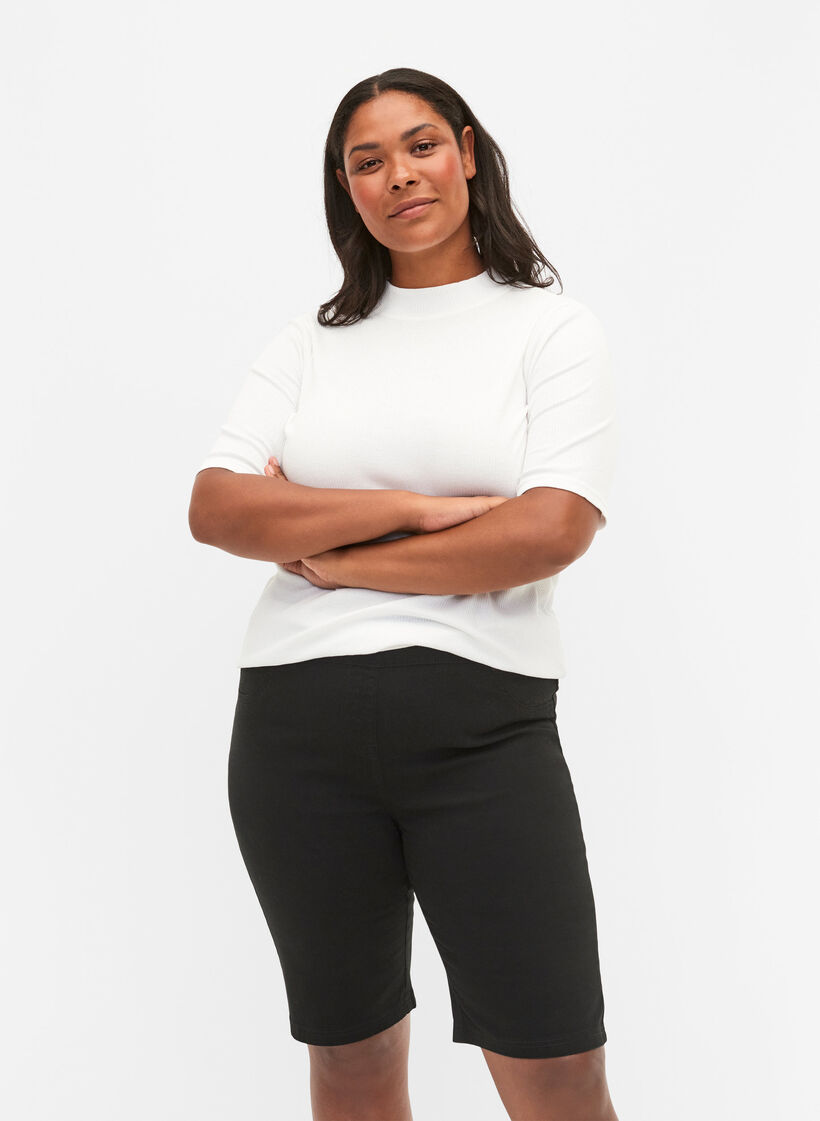 Close-fitting shorts with back pockets, Black, Model image number 0