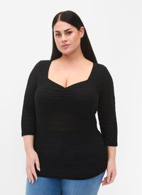 Tight-fitting blouse with ruffled detail, Black, Model