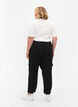 Solid coloured trousers with large pockets, Black, Model image number 1