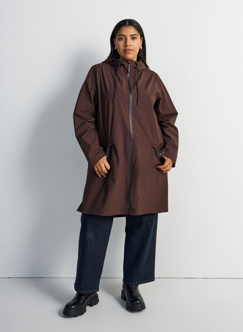 Raincoat with pockets and hood, Brown, Model image number 1