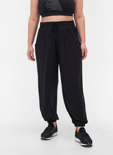 Loose exercise trousers with pockets in viscose, Black, Model image number 0