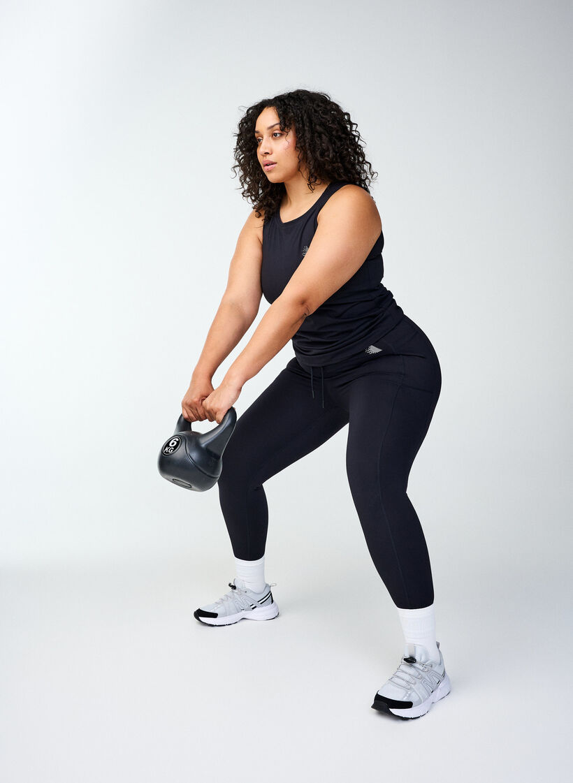 7/8 training tights with pockets, Black, Image image number 1