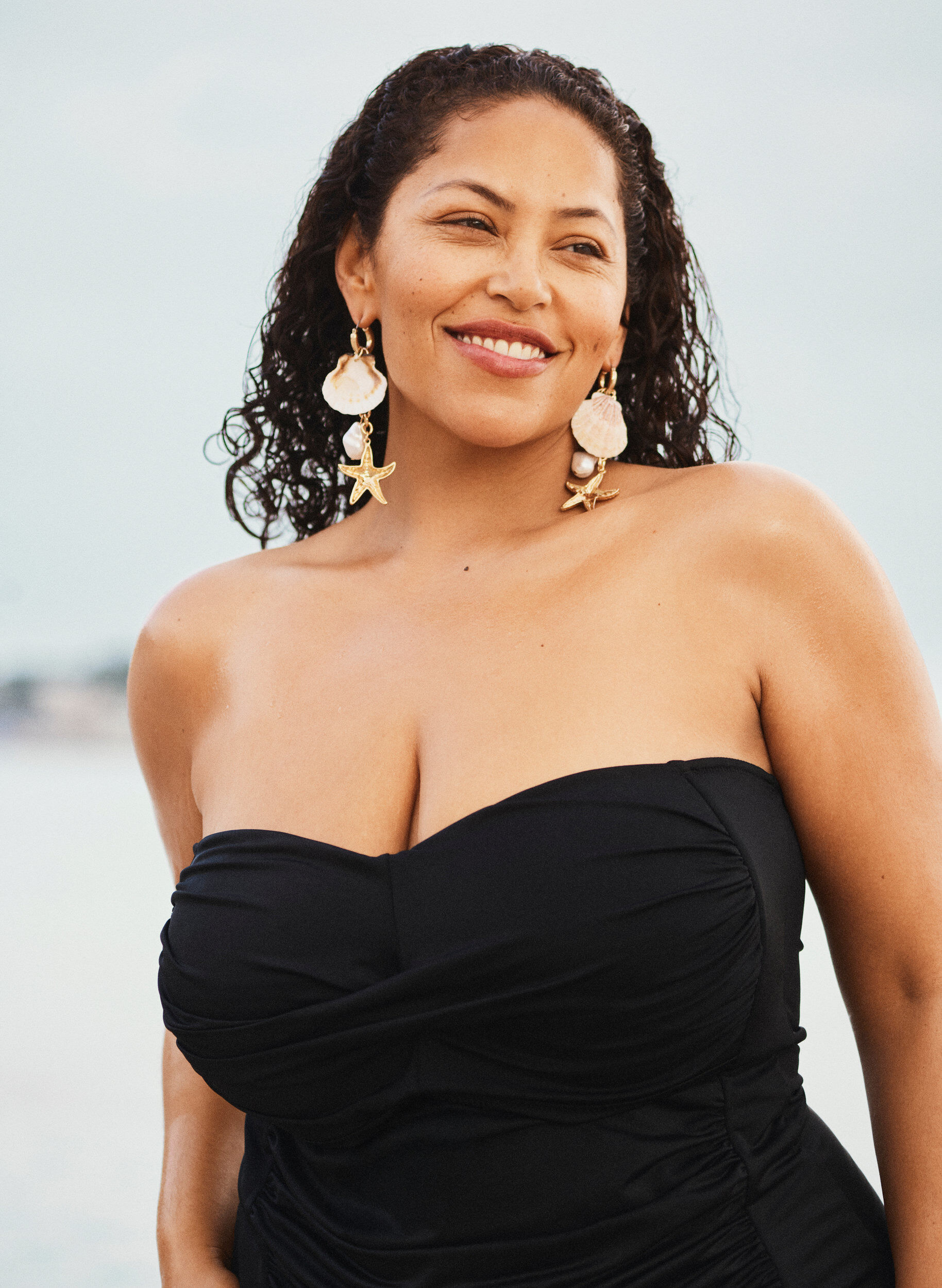 Strapless swimsuit with draping and padded cups