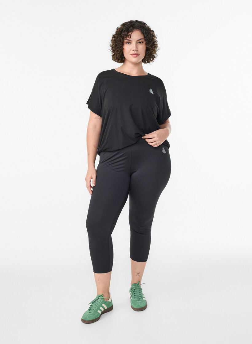 Close-fit workout capris, Black, Model image number 1
