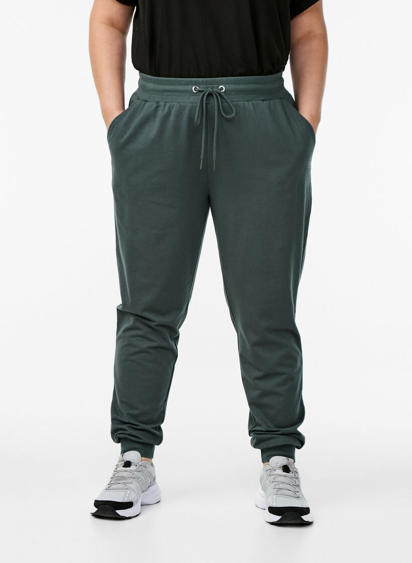 Loose tracksuit trousers with pockets, Green, Model image number 2