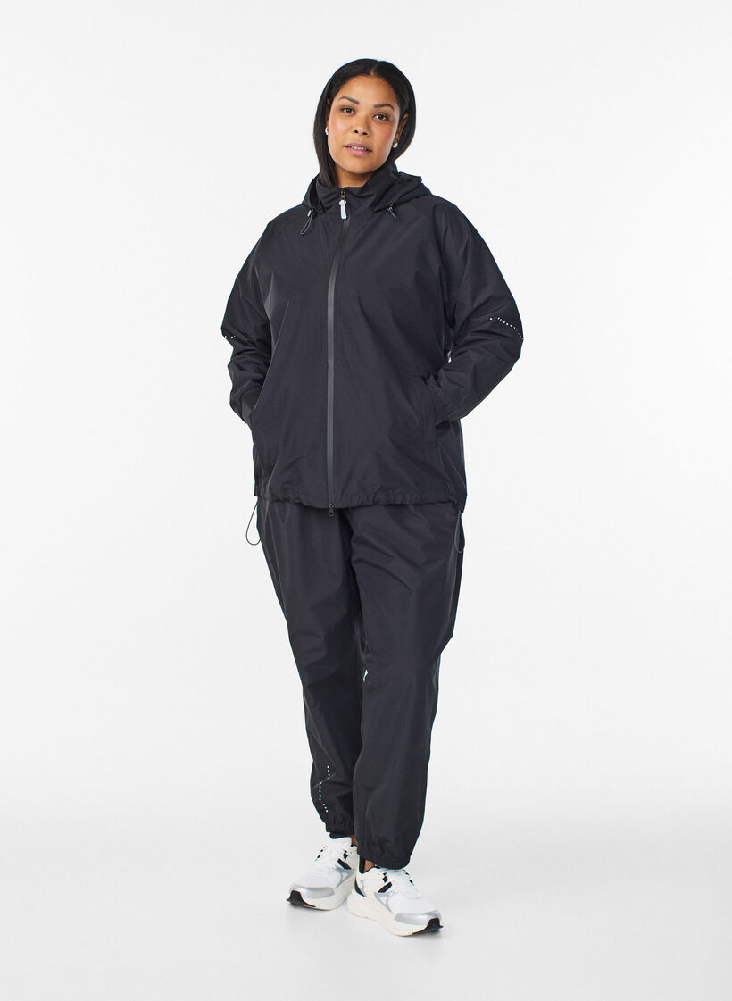 Rain jacket with reflective details, Black, Model image number 1