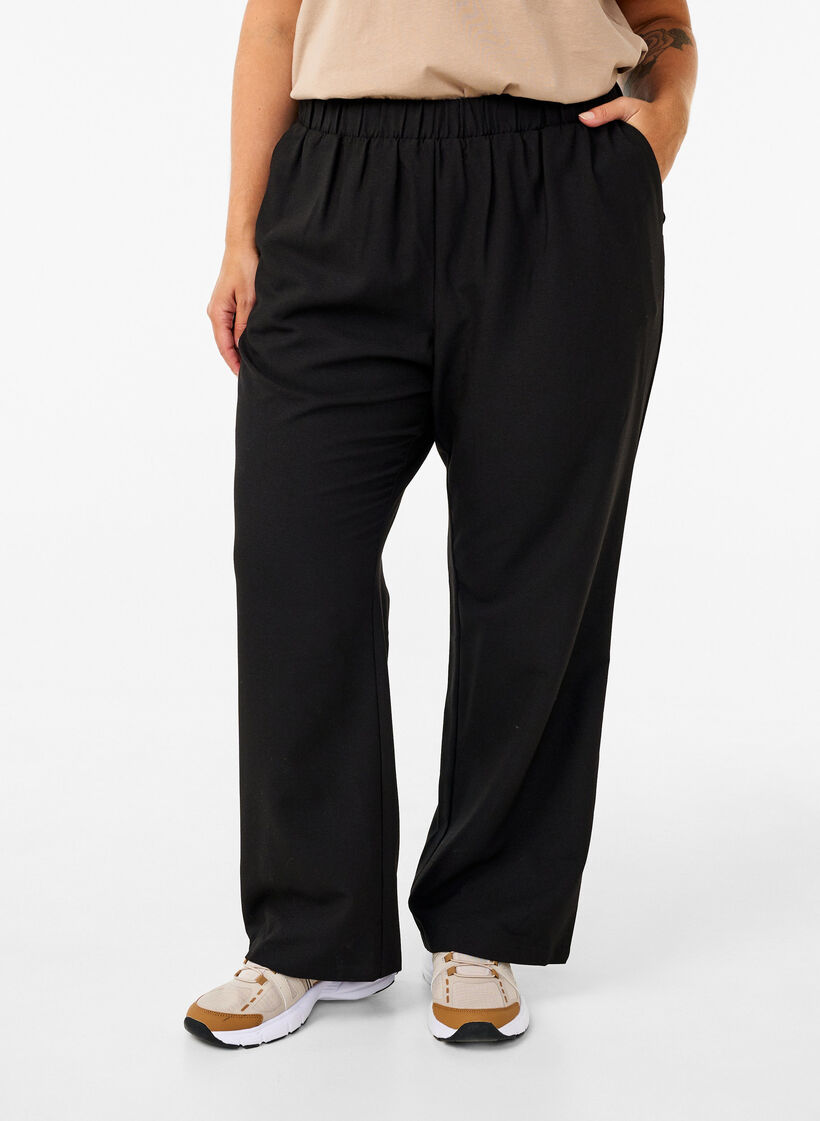 Flared trousers with pockets, Black, Model image number 2