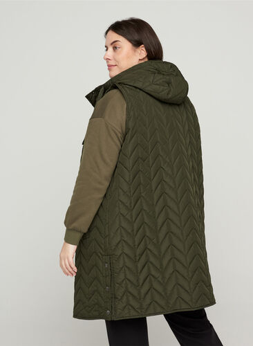 Long quilted vest with hood, Forest Night, Model image number 1