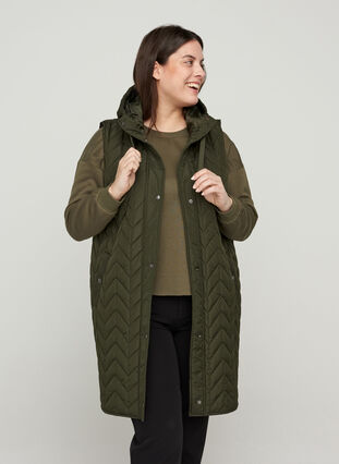Long quilted vest with hood, Forest Night, Model image number 0