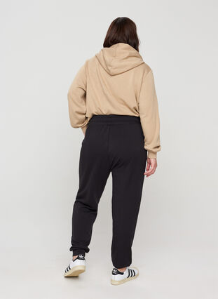Sweatpants with pockets and drawstrings, Black, Model image number 1