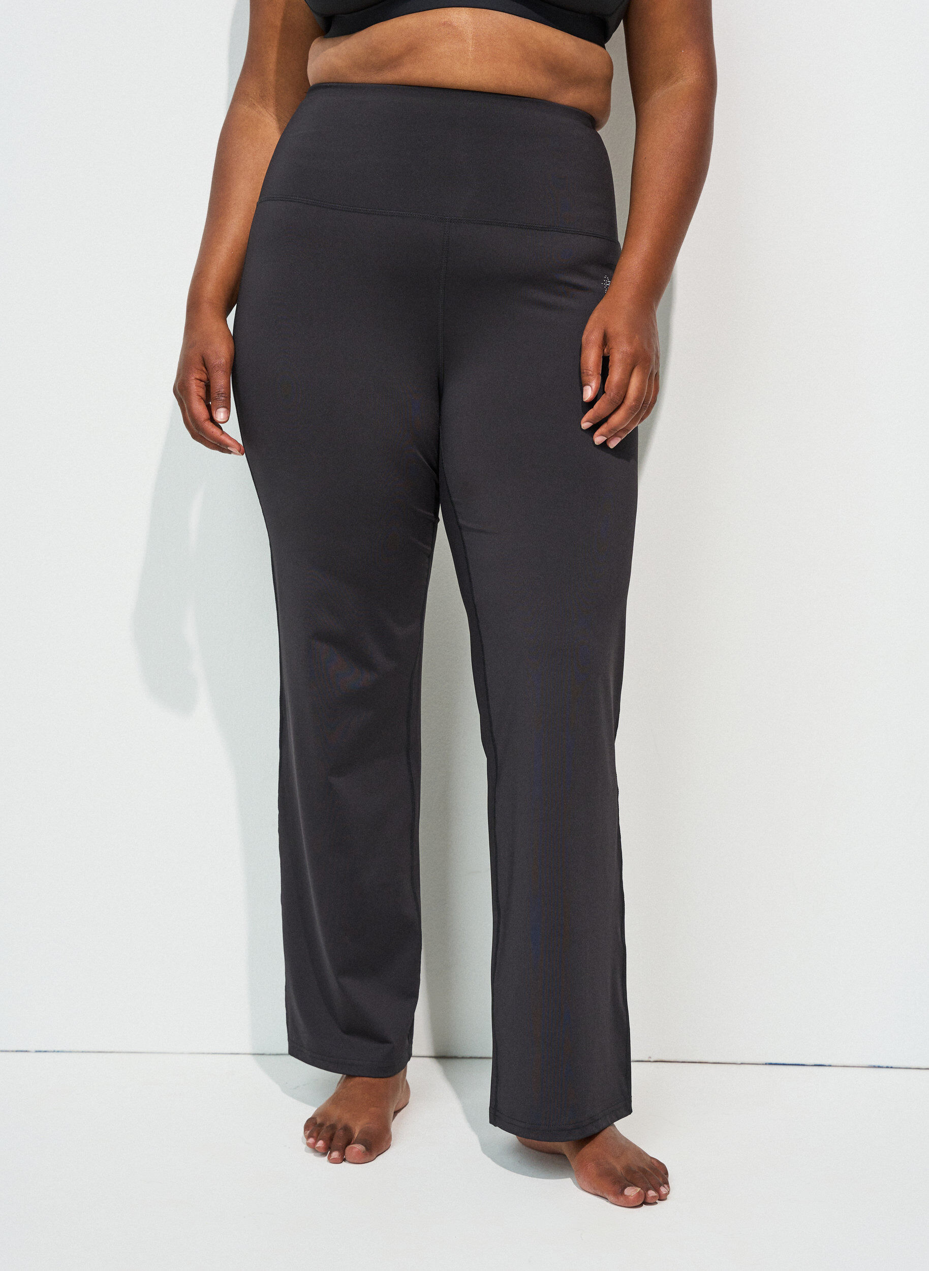 Zizzifashion Flared training trousers with high waist, Black, Model image number 0