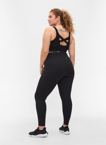 Gym leggings with back pocket and fleece, Black, Model image number 1