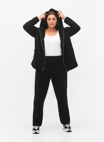 Loose cotton trousers with pockets, Black, Model image number 0