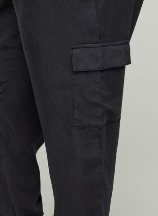 Lyocell trousers with large pockets, Black, Model image number 1