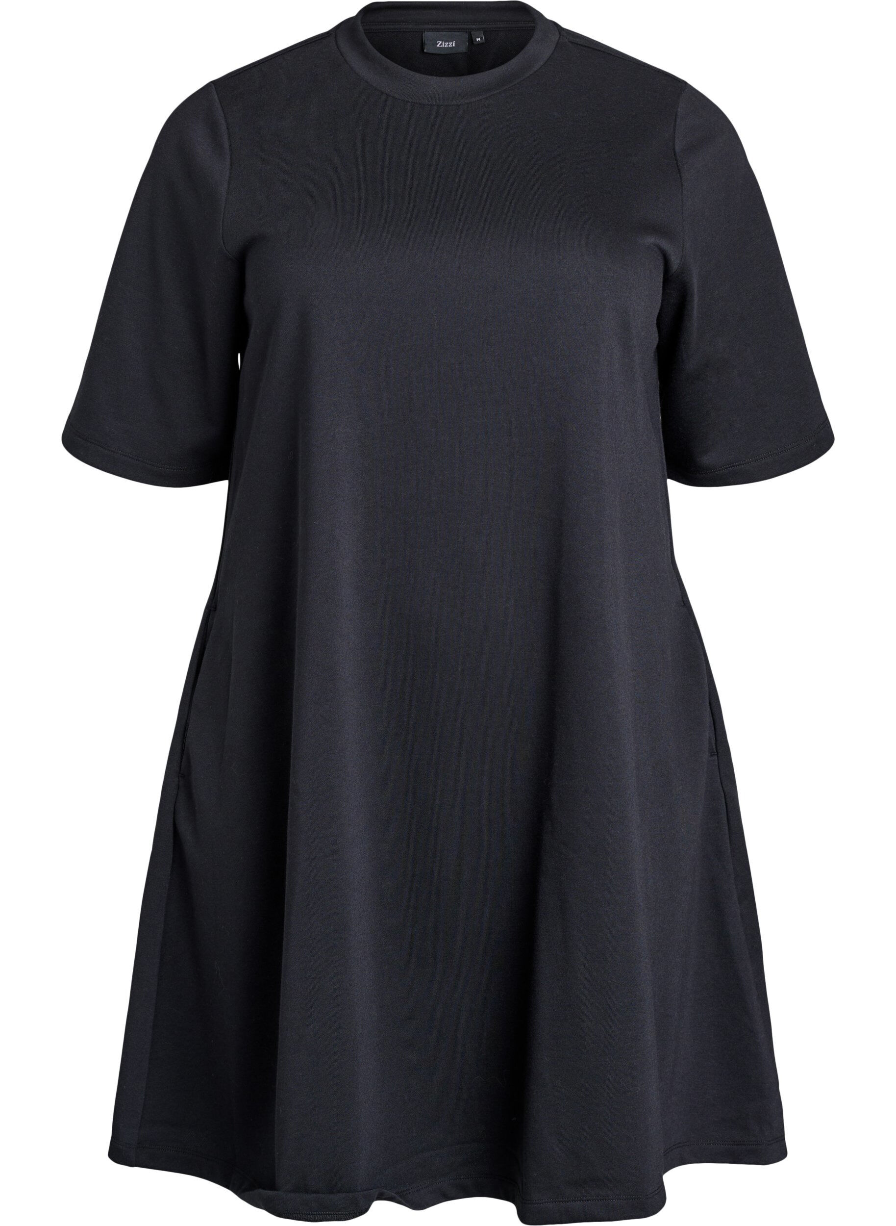 Knee-length jersey dress with pockets and A-line shape