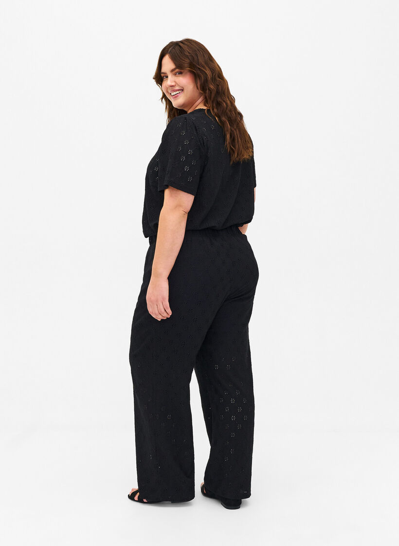 Loose trousers with hole pattern, Black, Model image number 1