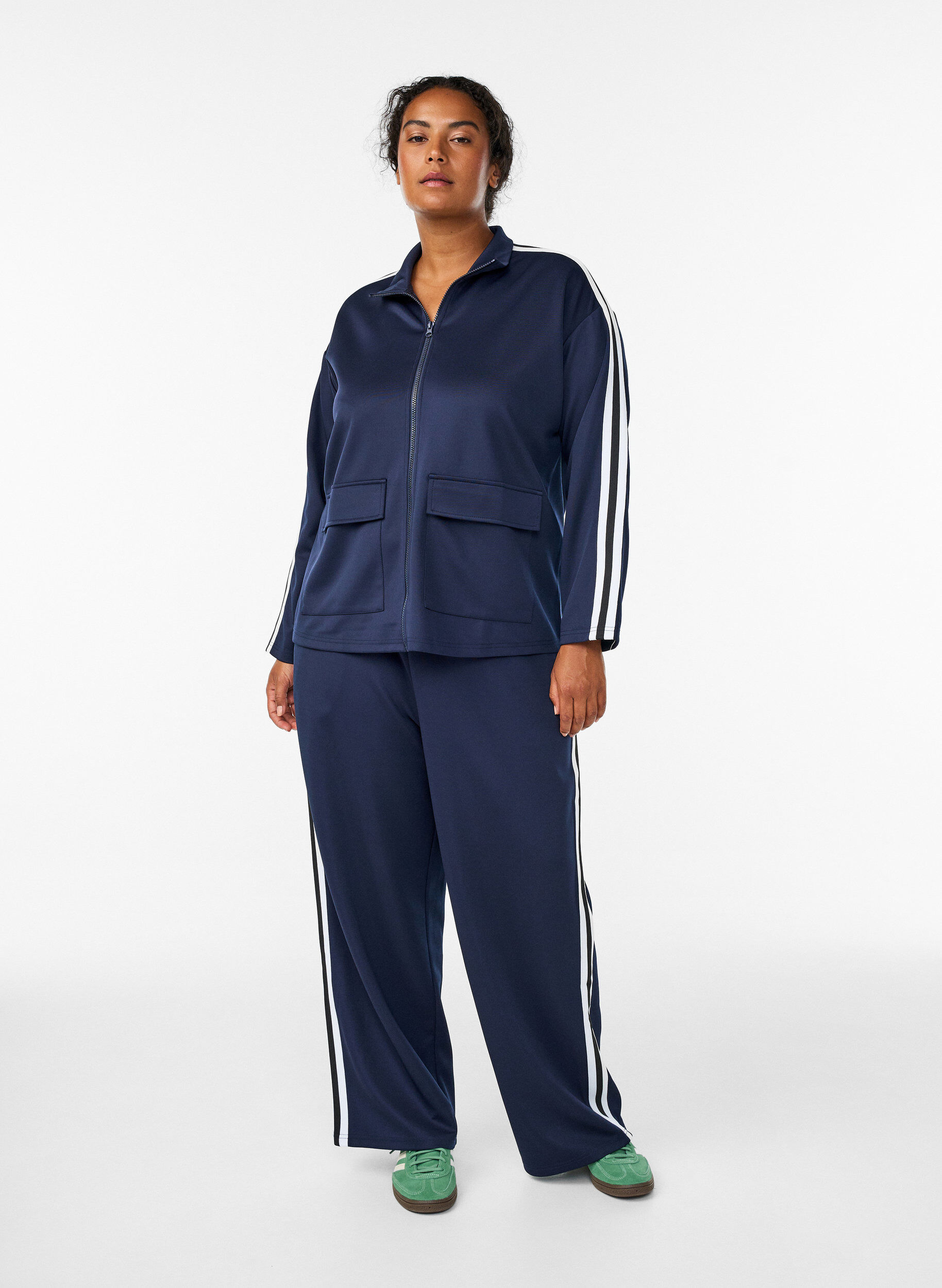 Track pants with high waist and sporty stripes, Blue, Model
