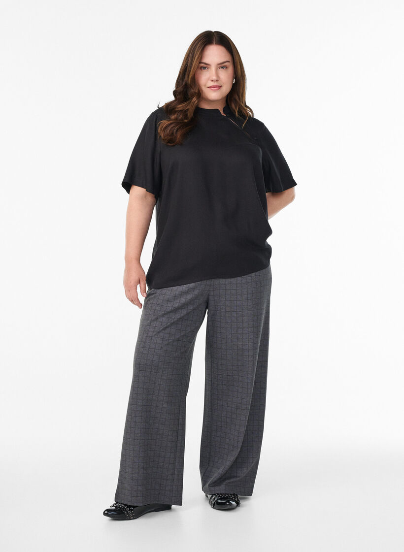 Short-sleeved blouse with diagonal button fastening, Black, Model image number 1