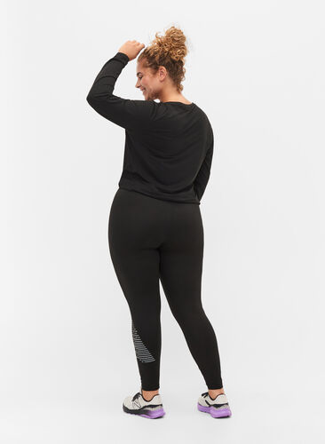 Training tights with reflective print, Black w. Reflex, Model image number 1