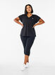 Loose training t-shirt with v-neck, Black, Model image number 1
