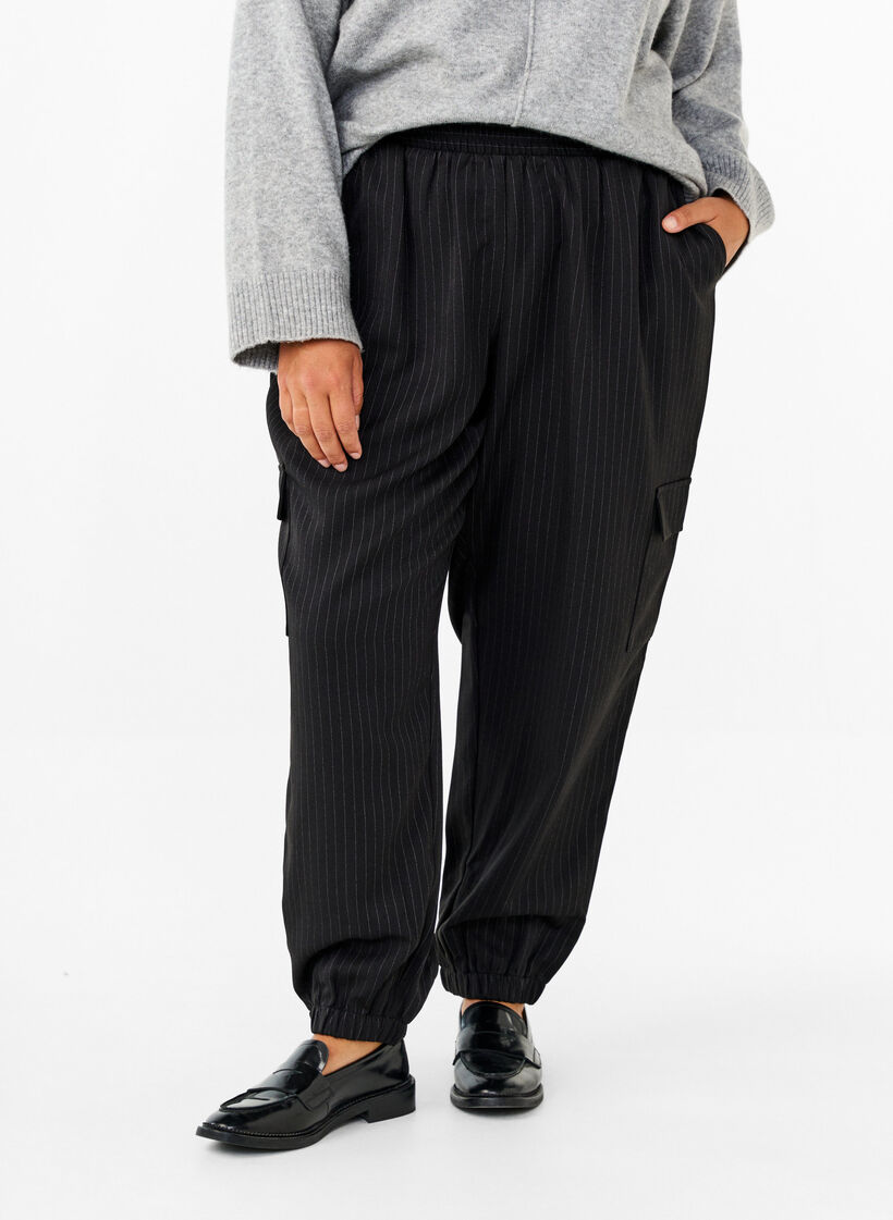 Trousers with cargo pockets and elasticated waist, Black, Model image number 2