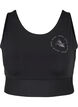 CORE, MID SUPPORT SPORTS BRA - Sports bra with v-back, Black, Packshot image number 0