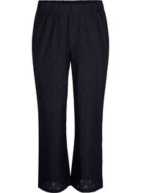 Loose trousers with hole pattern