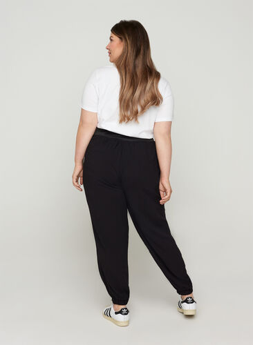 Loose trousers in viscose with elasticated cuffs, Black, Model image number 1
