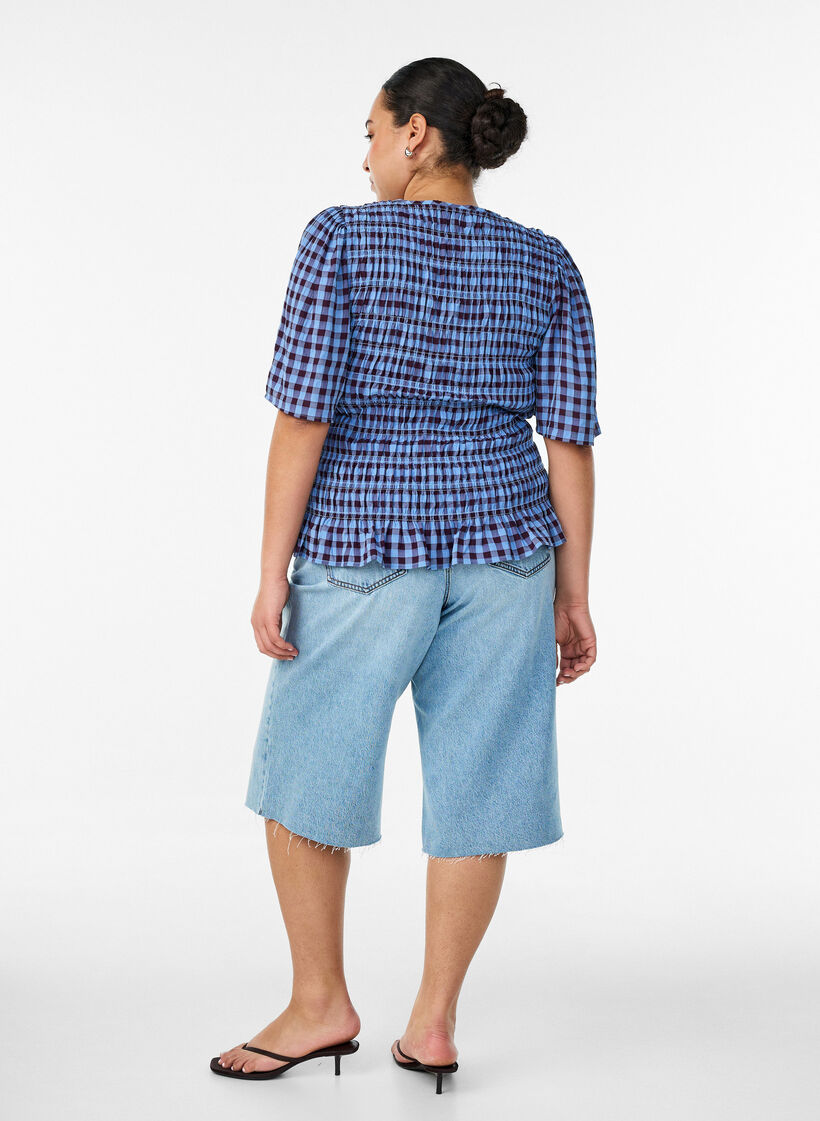 Cropped jeans with a distressed look and raw edges, Light Blue, Model image number 1