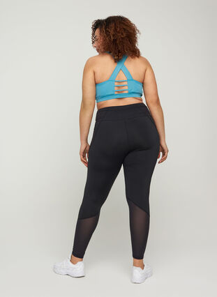 Cropped exercise tights with pocket, Black, Model image number 1