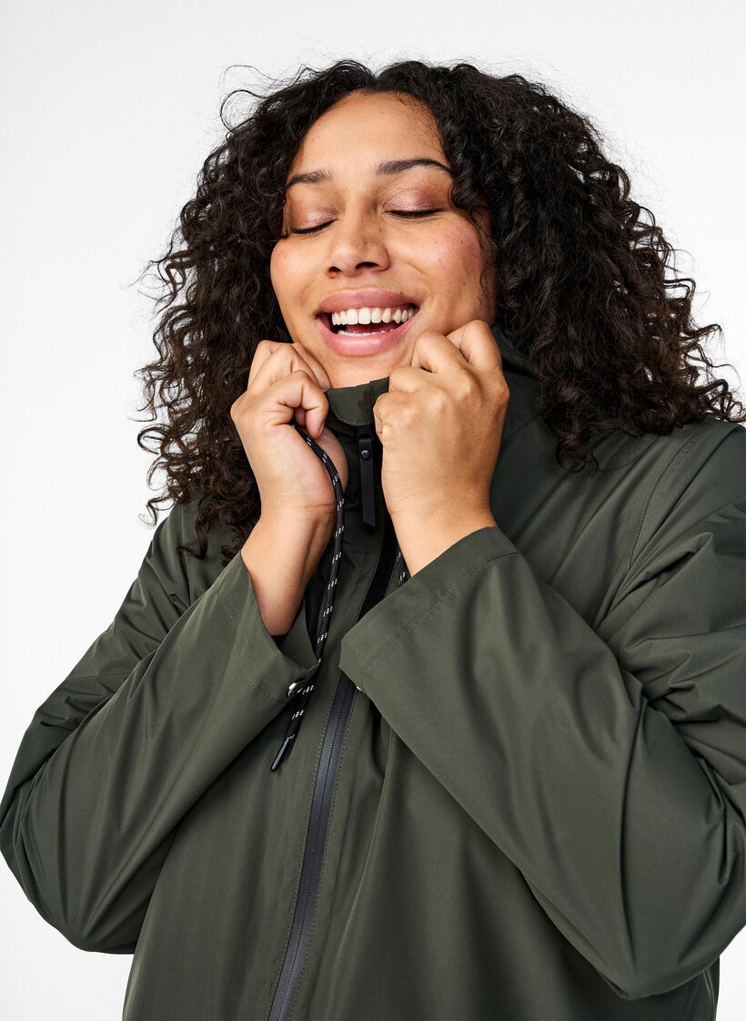 Rain jacket with pockets and a hood, Green, Model image number 3