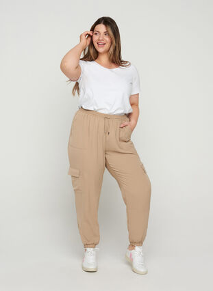 Loose trousers with large pockets, Nomad, Model image number 0
