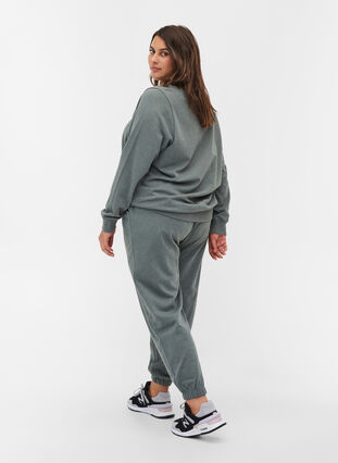 Loose sweatpants with pockets, Balsam Green Mel, Model image number 1
