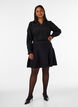 Short knitted A-line skirt, Black, Model image number 1