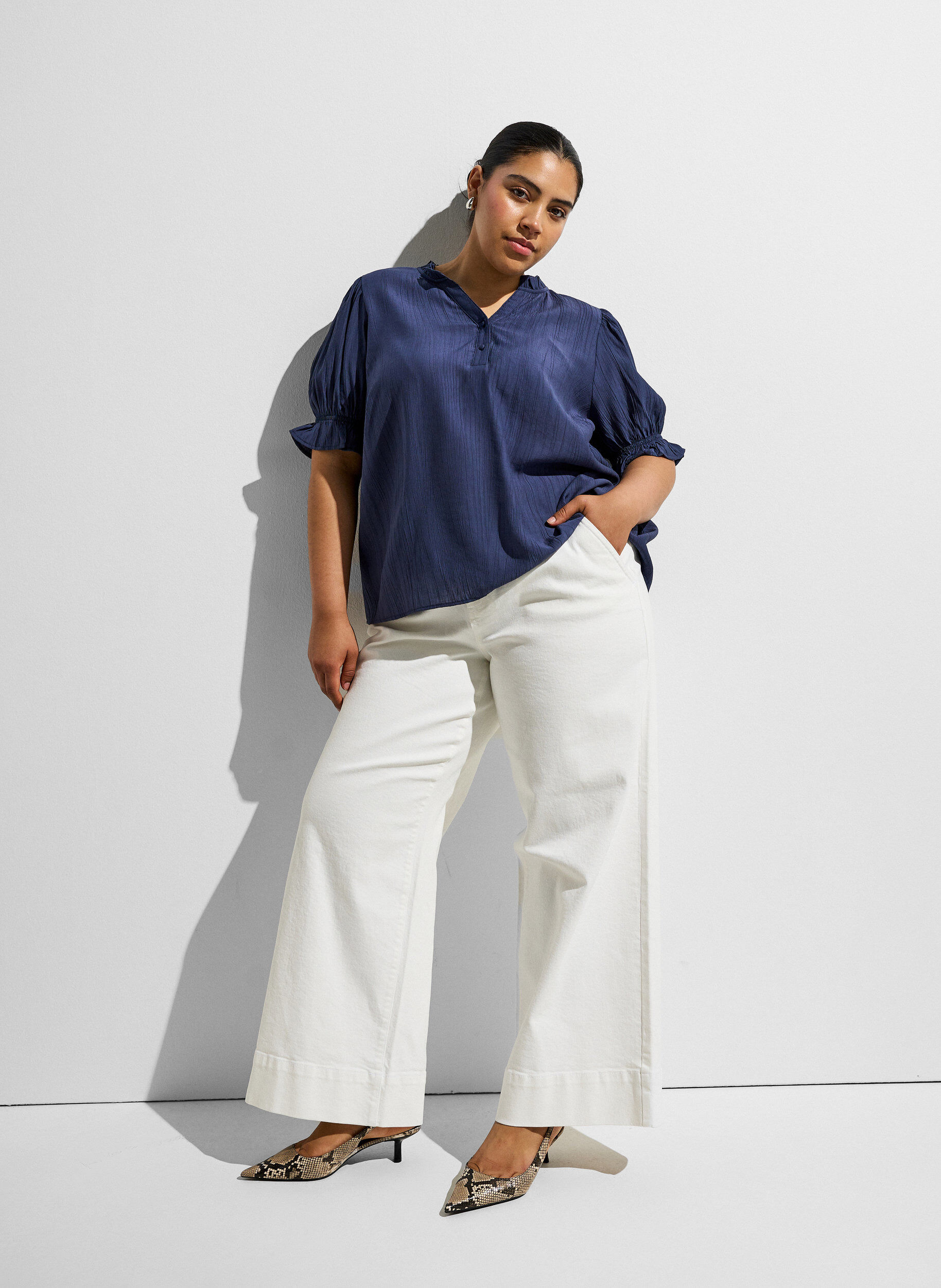 Blouse in a crinkled viscose blend with a V-neck