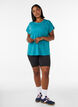 Solid-coloured training T-shirt, Petrol, Model image number 1