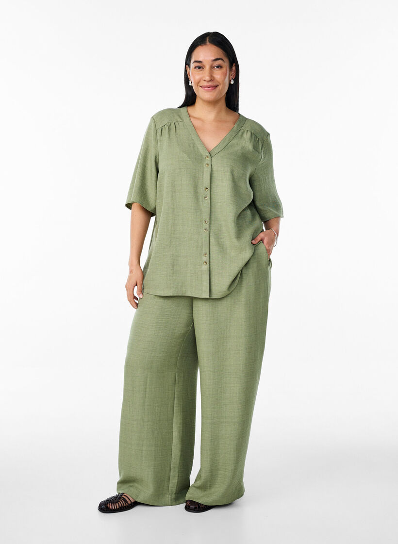 Loose trousers with elasticated waistband and pockets, Green, Model image number 0