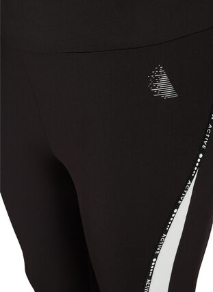 Cropped exercise tights with print details on the side, Black, Packshot image number 2