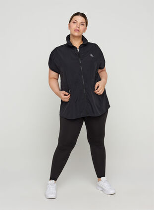 Sports vest with an adjustable waist and pockets, Black, Model image number 3