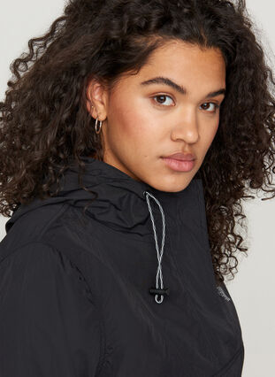 Anorak with a hood and pocket, Black, Model image number 2