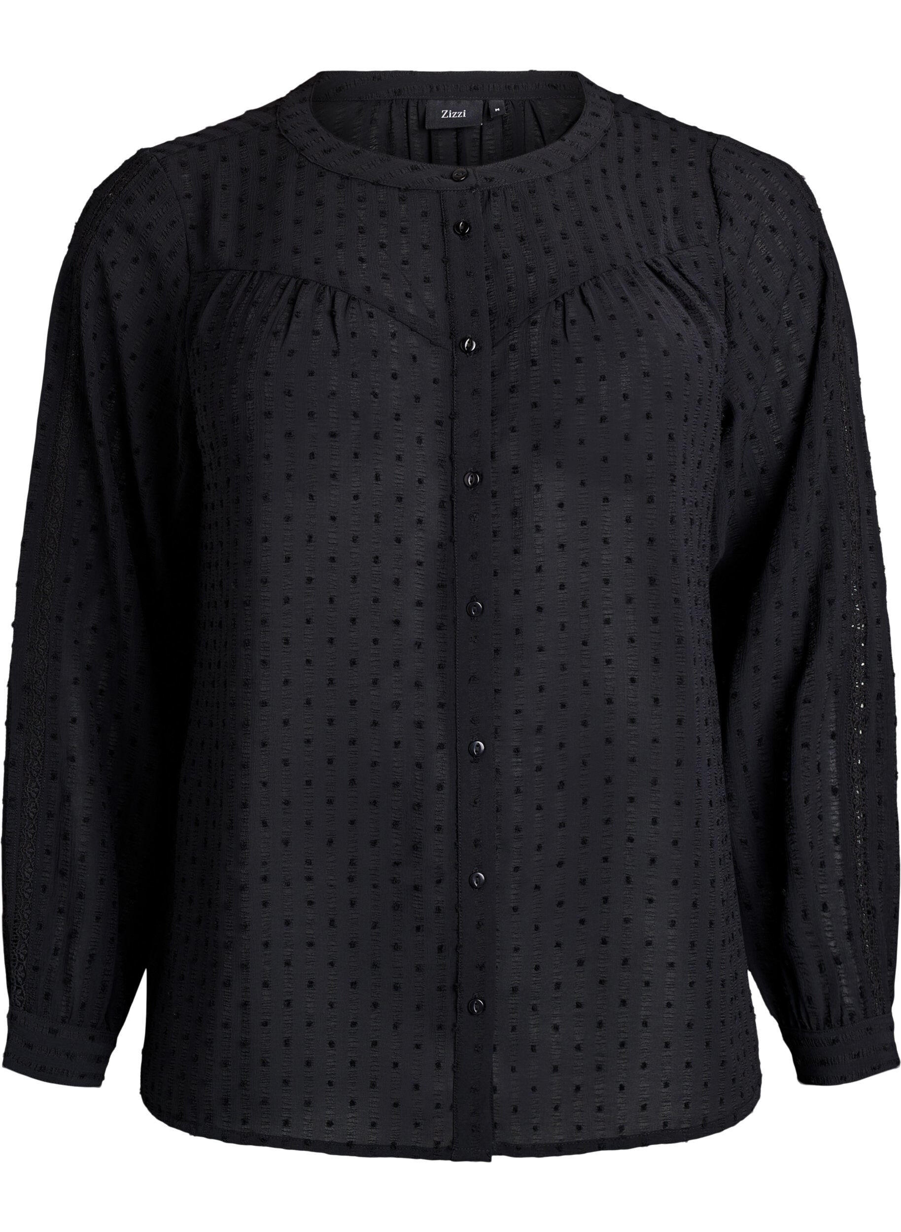 Shirt with a textured dot pattern and embroidery details