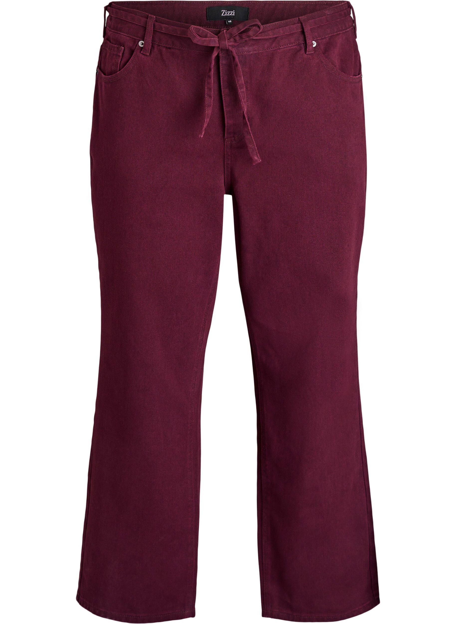 Coloured high-waisted jeans with a tie-belt