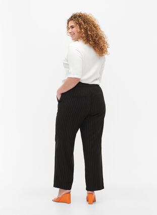 Trousers with pinstripes, Black W. Pinstripe, Model image number 1