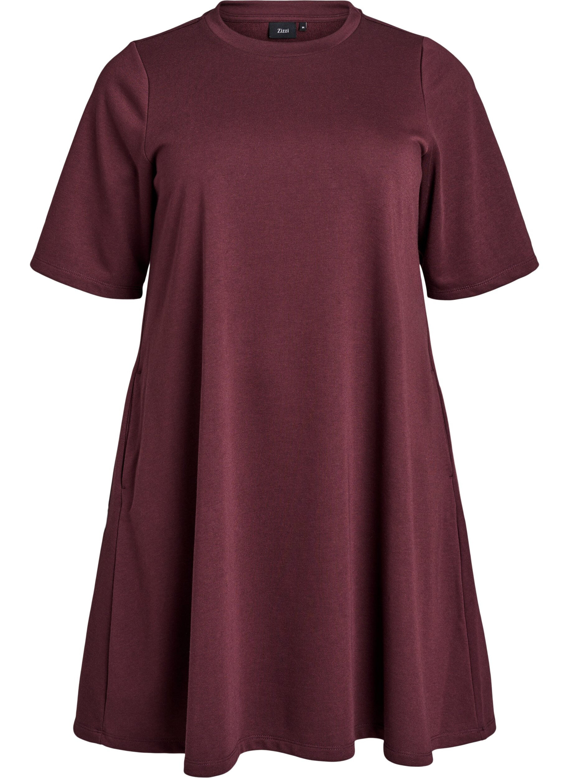 Knee-length jersey dress with pockets and A-line shape